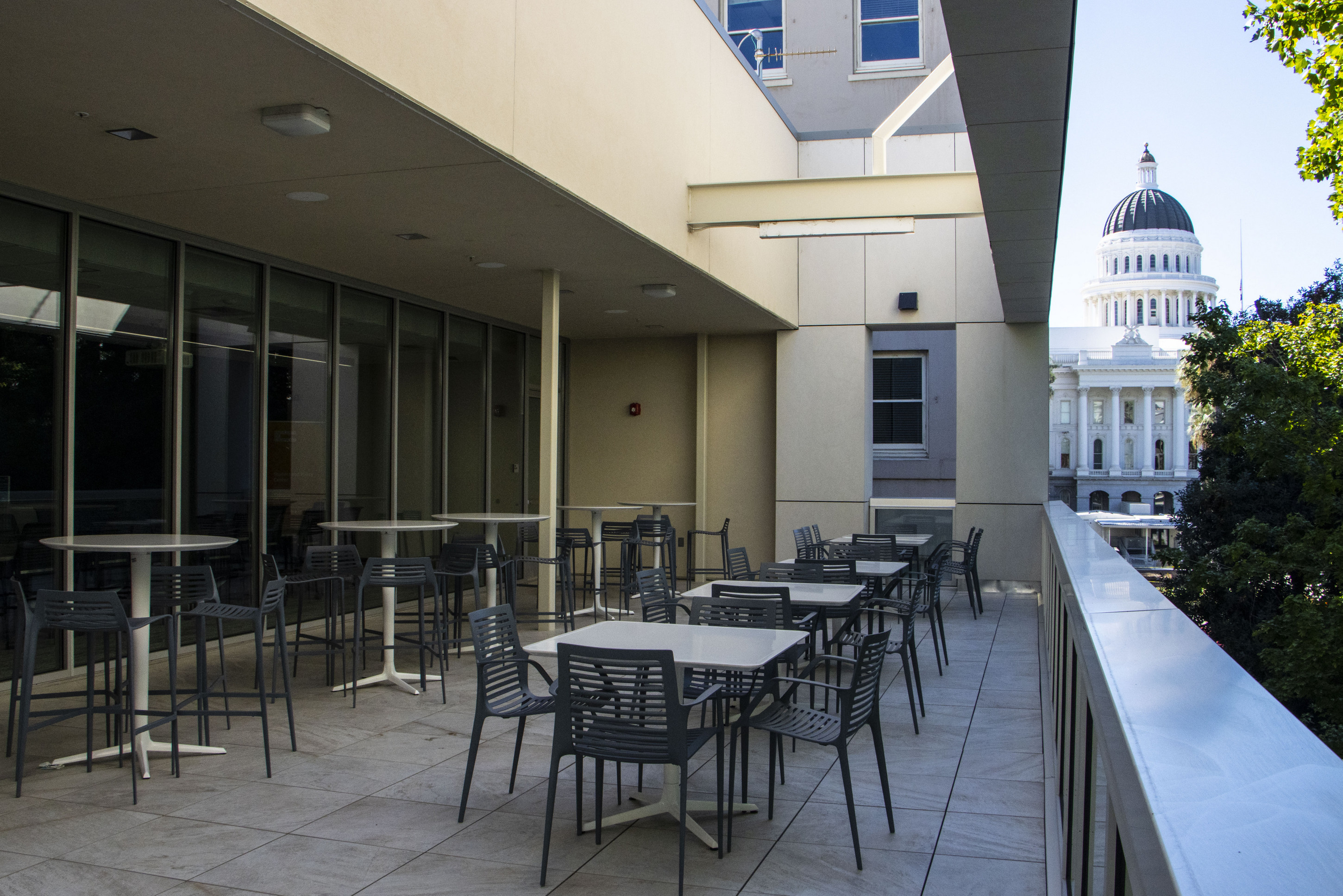 Balcony of an office building with the state capitol in the background